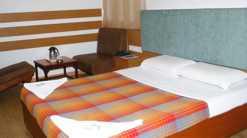 Hotel Kanishka Phg Бангалор Номер фото